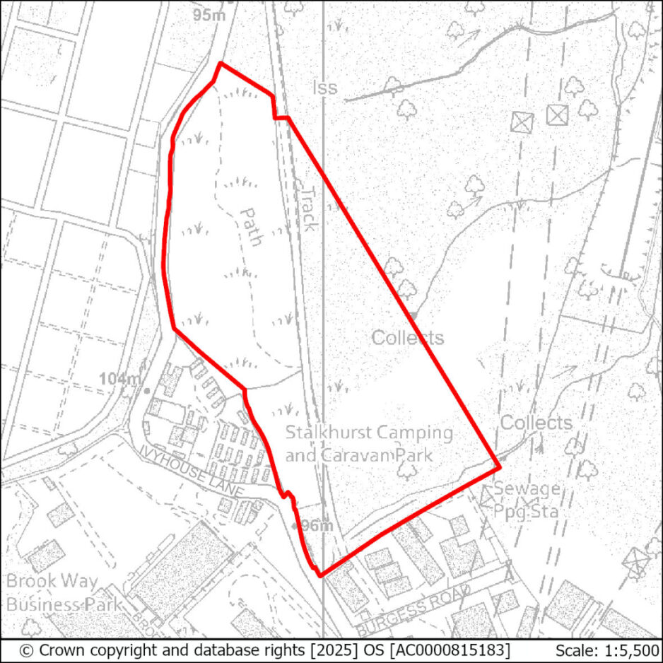 A walking route marked in red on a map, passing through a pond, a track, and two collection points near a camping and caravan park.
