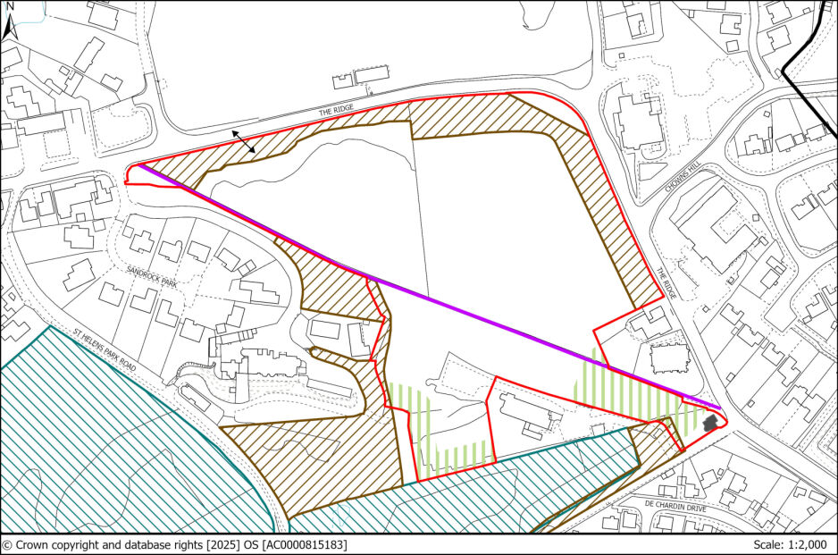 A map showing a defined area with boundary lines in red, a purple line crossing diagonally, and various boundaries marked with different colours and hatch patterns. Surrounding streets and residential areas are also depicted.