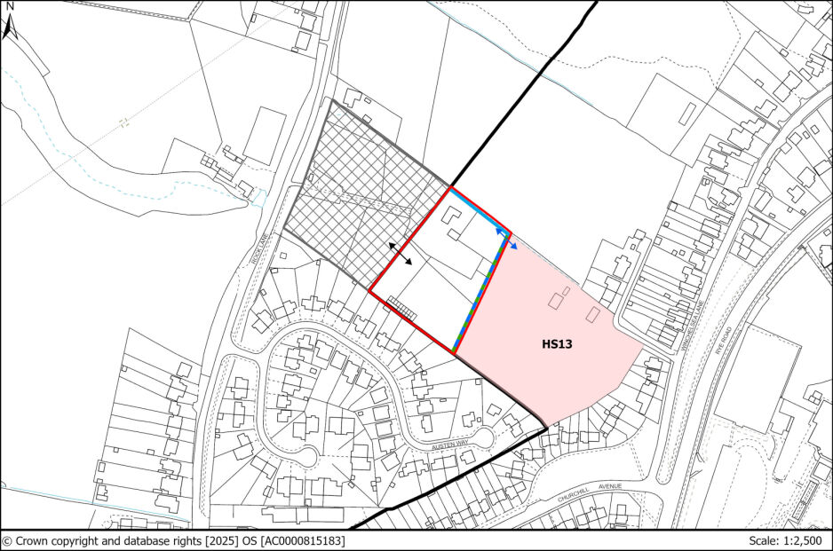 A detailed map showing a site plan with boundary lines marked in red, black, and blue, adjacent to residential and open areas. The site labelled HS13 is shaded in pink, with building outlines and property divisions. North is indicated at the top left corner.
